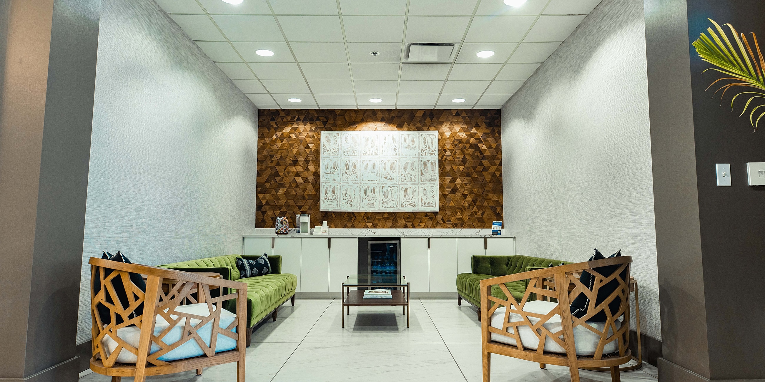 Stylish waiting area with modern furniture and decor.