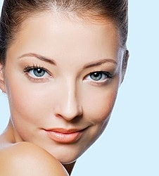 Woman with blue eyes and natural makeup.